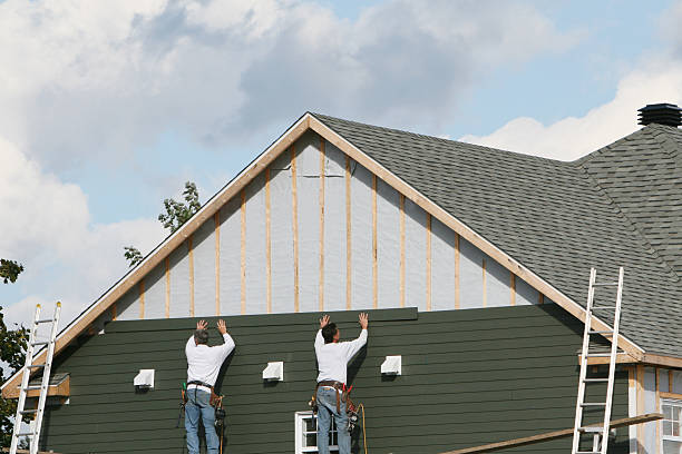 Professional Siding technician working in Hollsopple, PA